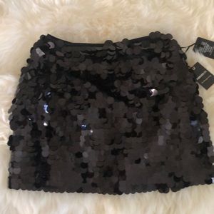 Party fun skirt with dimensional detail with movement .